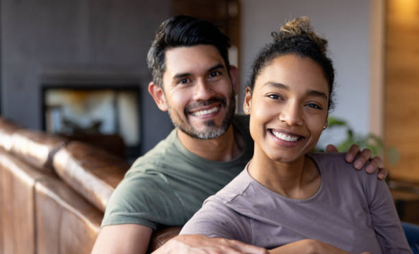 istock Couple looking very happy at home 1367252553