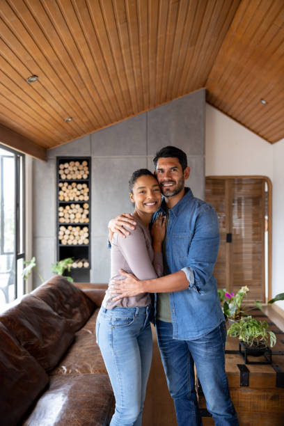 istock Loving couple hugging at their home 1367252835