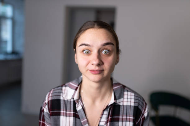 istock Surprised girl before makeup, with big eyes. 1367253008