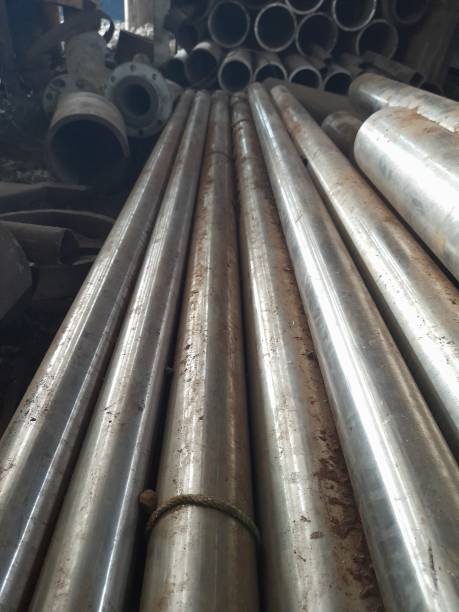 istock pile of iron pipes 1367269465