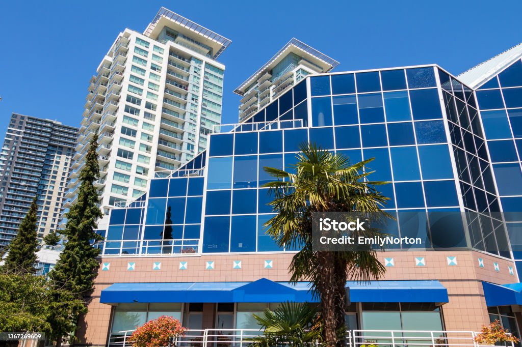 New Westminster, British Columbia Modern buildings lining the waterfront in New Westminster, British Columbia on a beautiful sunny day. Architecture Stock Photo