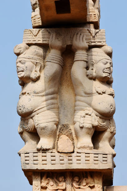 istock Stupa No 1, West Gateway, Pillars capitals showing Dwarfs holding pillars. World Heritage Site, Sanchi, Madhya Pradesh, India 1367275903