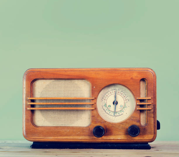 Retro radio Old style vintage radio over retro mint background with copyspace design. radio retro revival old old fashioned stock pictures, royalty-free photos & images