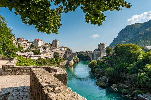 View of the Old Bridge in Mostar and the river Neretva View of the Old Bridge in Mostar and the river Neretva bosnia and herzegovina stock pictures, royalty-free photos & images
