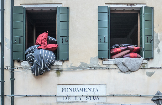Bedclothes Hanging Out of the Windows, Venice