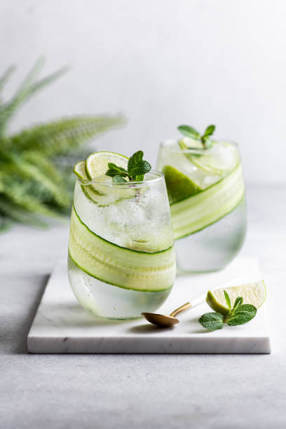 istock summer refreshing cocktail with lime and cucumber, selective focus 1367283782