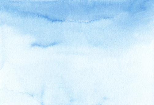 Watercolor pastel blue ombre background texture, hand painted.