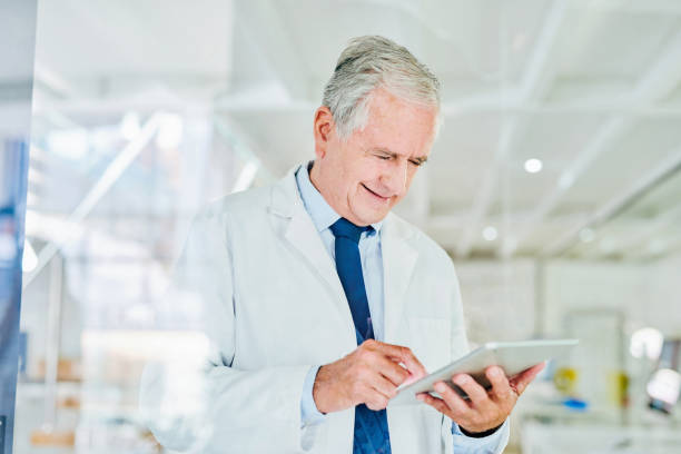 istock Shot of a senior scientist using a digital tablet in a lab 1367286713
