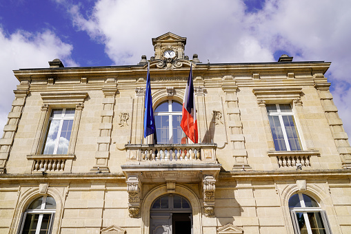 French tricolor and europa flag on mairie text building mean city hall in town center of Bouliac in france