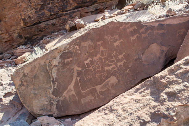 istock Lion Plate with Lion Man Twyfelfontein Rock Engravings in Namibia 1367290534