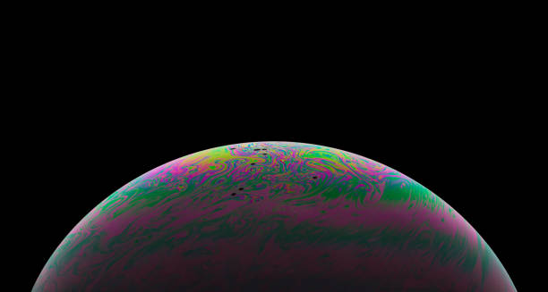 istock Virtual reality space with abstract multicolor psychedelic planet. Closeup Soap bubble like an alien planet on black background. 1367290632
