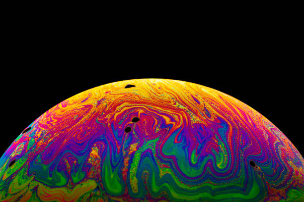 istock Virtual reality space with abstract multicolor psychedelic planet. Closeup Soap bubble like an alien planet on black background. 1367291242