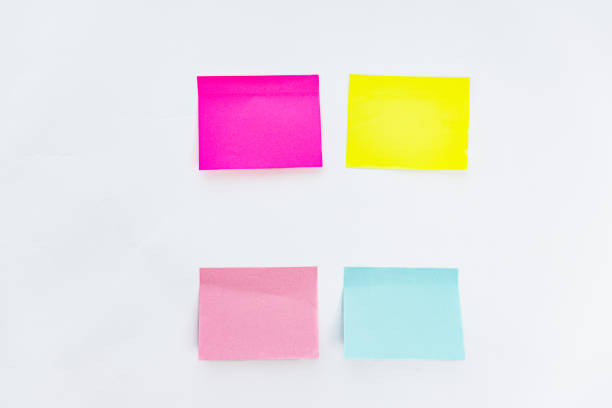 Colorful blank sticky notes forming a regular pattern are providing space for your copy