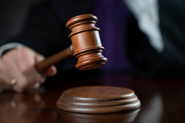 istock Judge in the courtroom. 1367297827