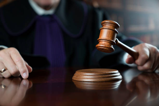 istock Judge in the courtroom. 1367297972