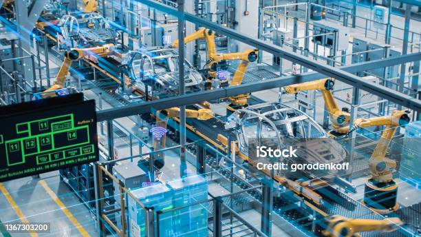 Car Factory Digitalization Industry 40 5g Iot Concept Automated Robot Arm Assembly Line Manufacturing Hightech Electric Vehicles Ai Computer Vision Analyzing Scanning Production Efficiency Stock Photo - Download Image Now