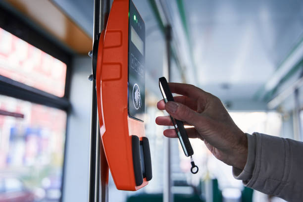 istock Senior man buy a ticket on public transport in the terminal using application 1367306503