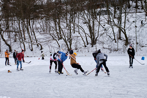 Shot on a frozen pond below  Mnisek pod Brdy Chateau, a small village close to Prague, where local group of boys gathered to enjoy an ice hokey game during winter afternoon.
