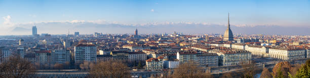 istock Panoramic view of Turin skyline with Alps in the background 1367312144