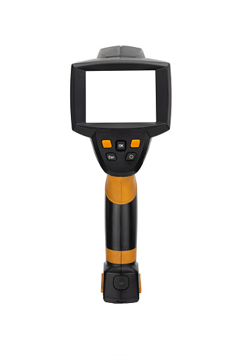 thermal imager on a white background. device for monitoring the temperature distribution of the investigated surface. camera for non-contact measurement of body temperature in public places.