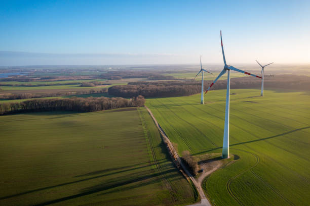 istock some White wind turbines rotate in the wind under blue sky 1367313484
