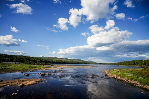 istock landscape with river and clouds, in Norway Scandinavia North Europe 1367314408