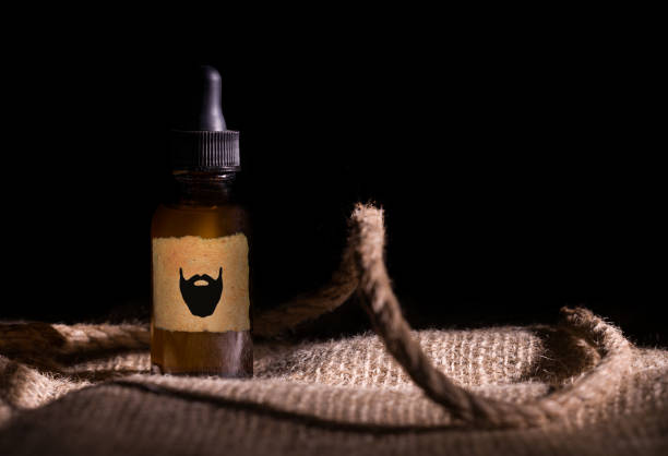 istock Presentation of beard oil, ready mock-up. Bottle with dropper. Climatic composite. 1367316167