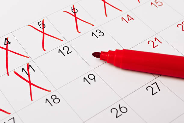 istock close up of a calendar page with red pen 1367317206