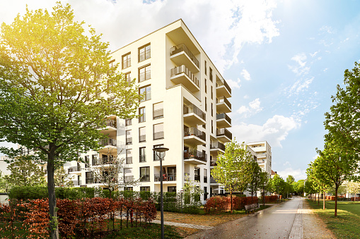 Cityscape of a residential area with modern apartment buildings, new green urban landscape in the city