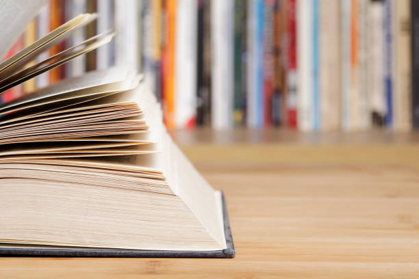istock Open book close up at the library 1367320172