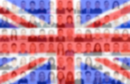 Portraits of many people on the background of the flag of Great Britain. The concept of the population and demographic state of the country.