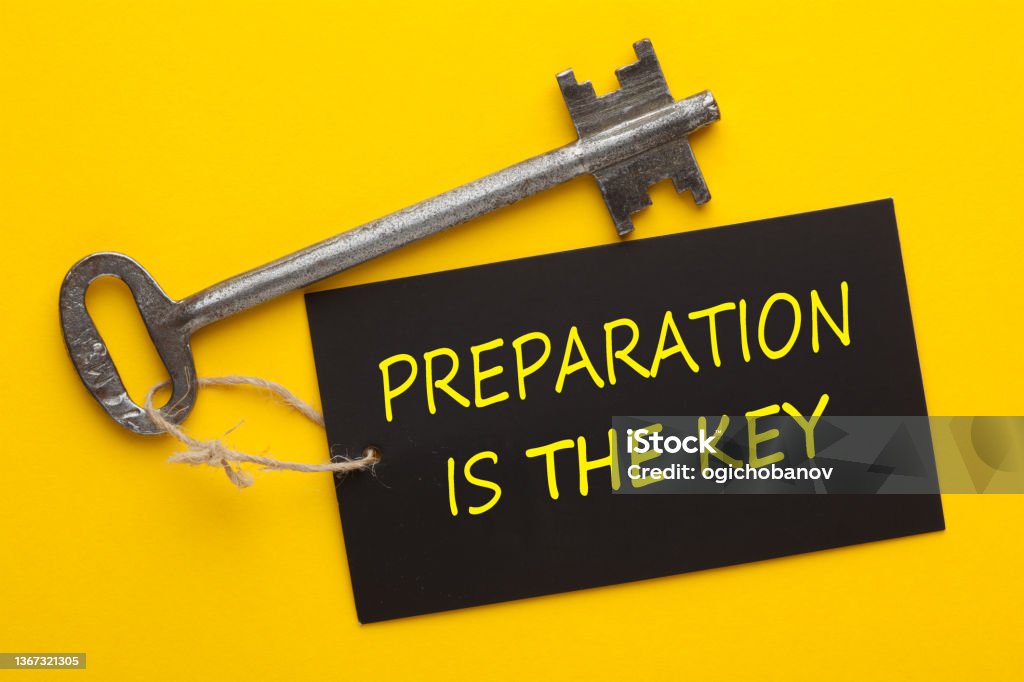 Preparation Is The Key Preparation is the key. Concept using an old key with a tag. Preparation Stock Photo