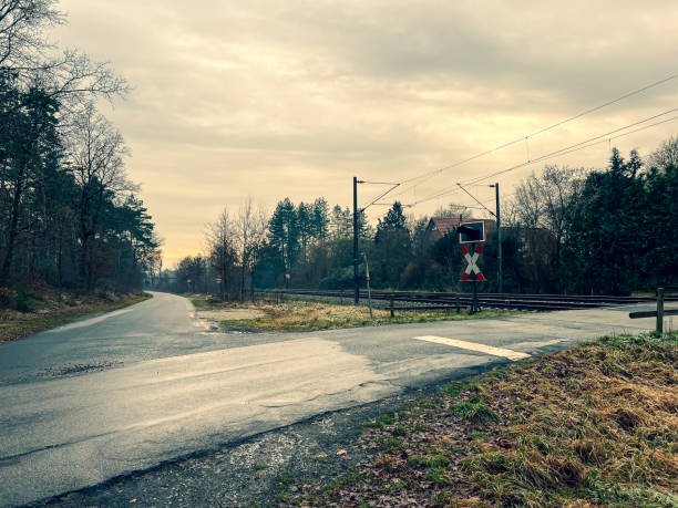 A road junction at the railway tracks in Germany.