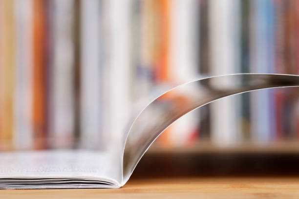 istock Close up of open magazine at the library 1367322079