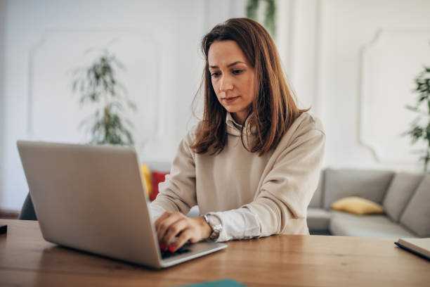 istock Businesswoman working on laptop 1367322827