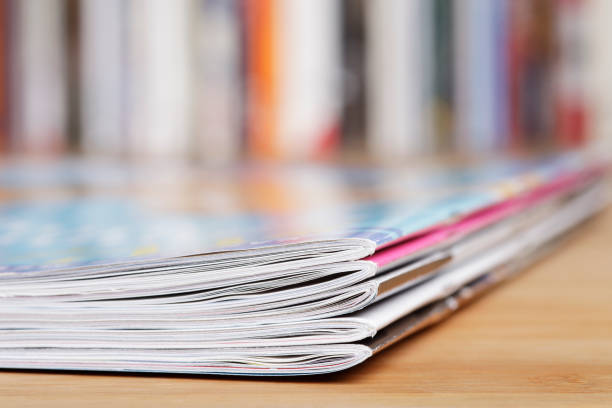 istock Stack of magazines that progressively blurs toward the right 1367322993
