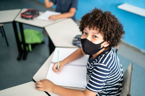 istock Portrait of a boy in the classroom 1367324726