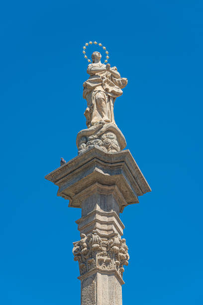 istock Statues at Marian Column or Holy Trinity at Hradcanske Square for bubonic plague pandemics in Prague, Czech Republic, details, closeup 1367326583