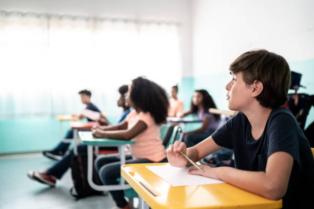 istock Kids in the classroom 1367329981