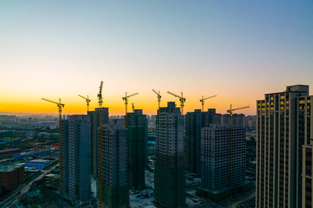 istock Construction site with cranes in the morning 1367330000