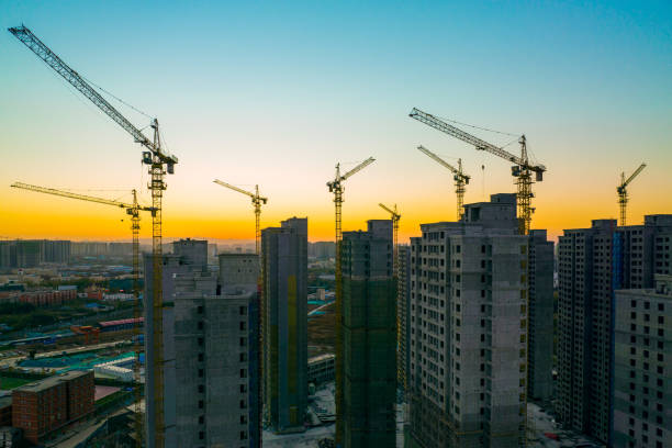 istock Construction site with cranes in the morning 1367330043