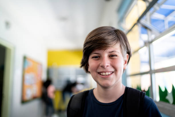 istock Portrait of a boy at school 1367330088