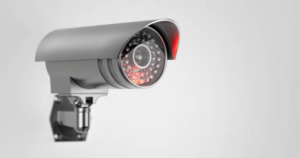 istock Modern surveillance camera with an infrared light inserted in it from the side in close up 1367332529
