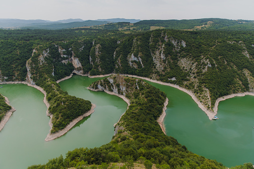 Scenic view of the Uvac canyon hidden in the hills during summer sunset in Serbia, the Balkans
