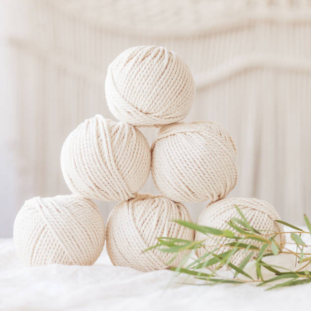 istock Handmade macrame braiding and cotton threads. Image good for macrame and handicrafts banners and advertisement.  Copy space 1367340541