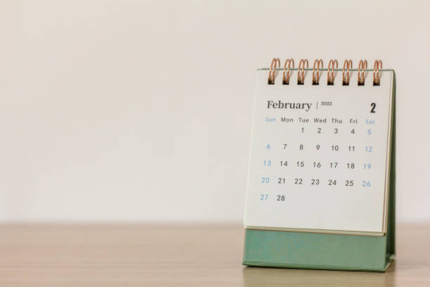 istock Desktop calendar for February 2022 on a light background., 1367340751