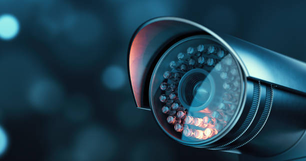 istock Close up of CCTV camera with infrared light over defocused background with copy space 1367341388