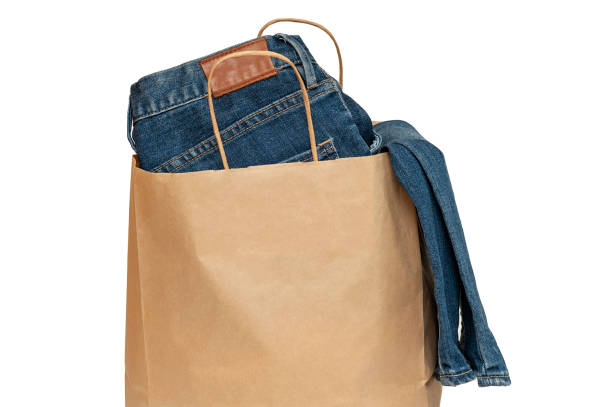 istock Jeans in a paper bag on a white background 1367341538