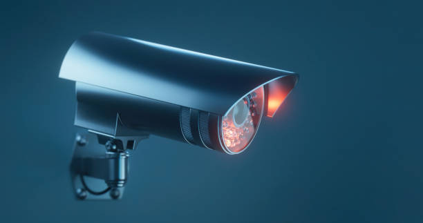 istock Graphic design of a security camera on a blue background 1367341722