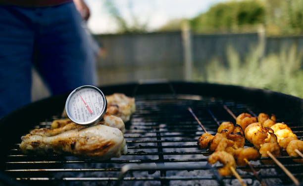 istock A food thermometer checking that chicken is being cooked correctly. 1367343390